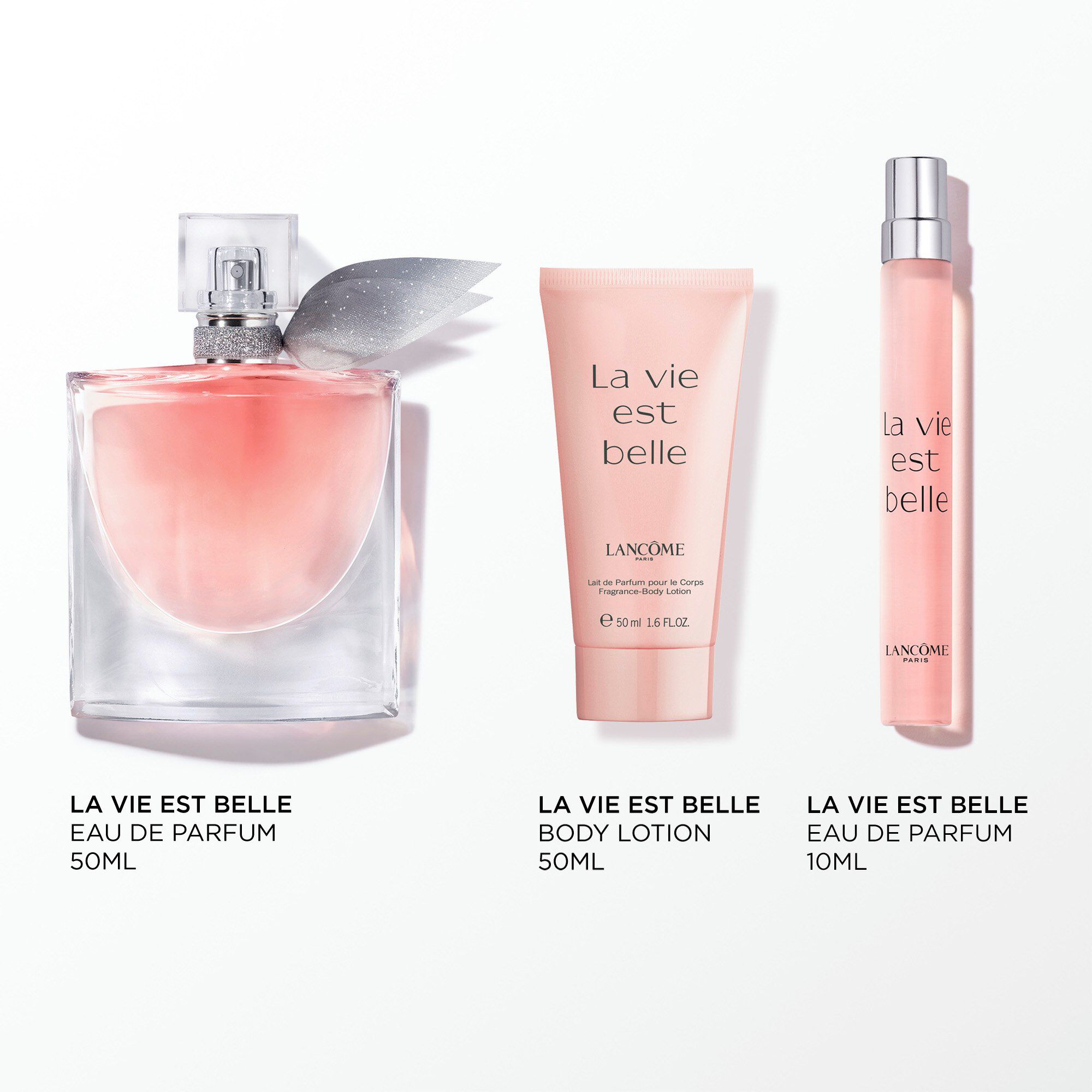 Image of the following products on a white background: LA VIE EST BELLE EDP 50ML - LA VIE EST BELLE EDP 10ML - LA VIE EST BELLE BODY LOTION 50ML